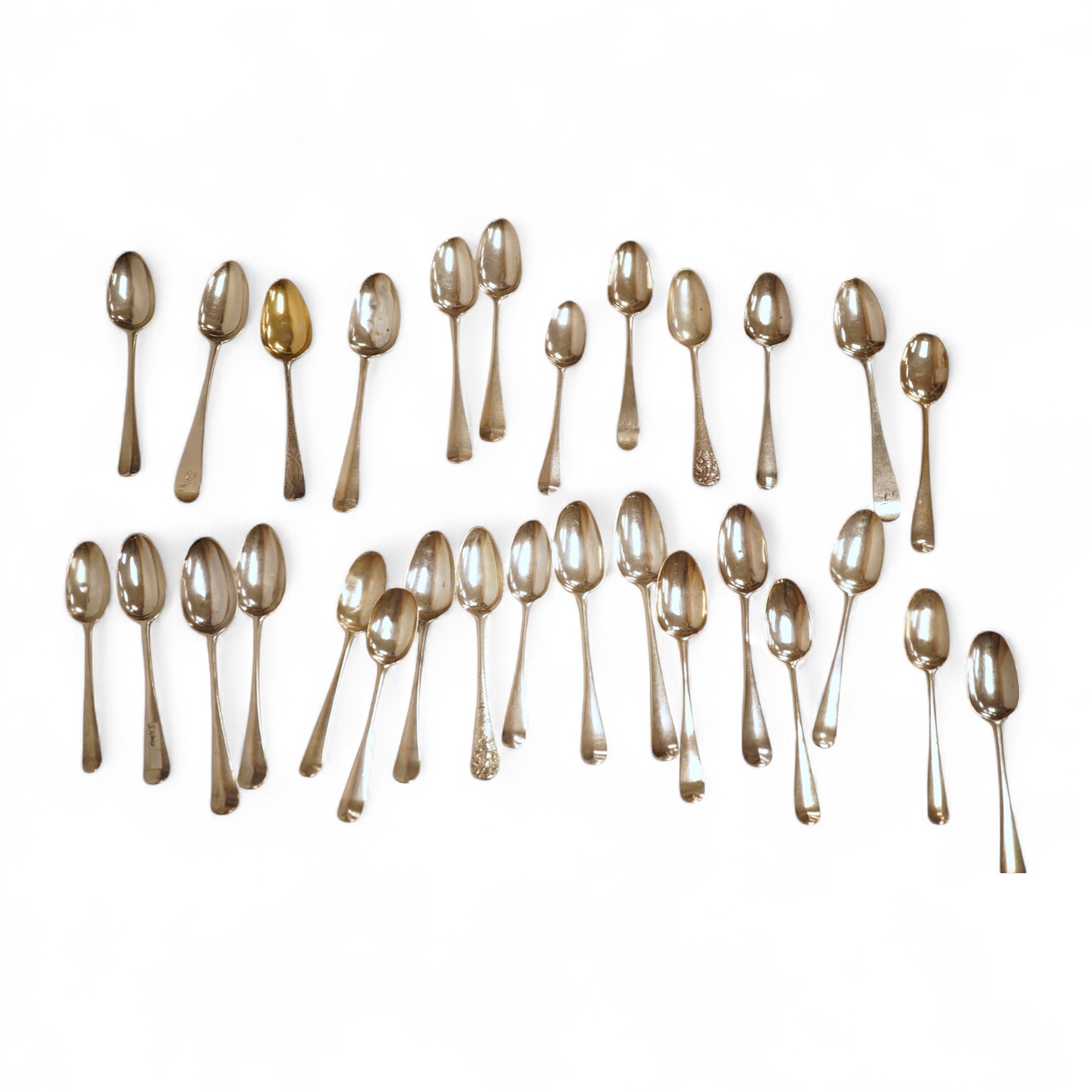 A collection of twenty nine assorted Georgian picture back teaspoons, various dates and makers, including three with masted ship, some marks indistinct, 10.2oz.